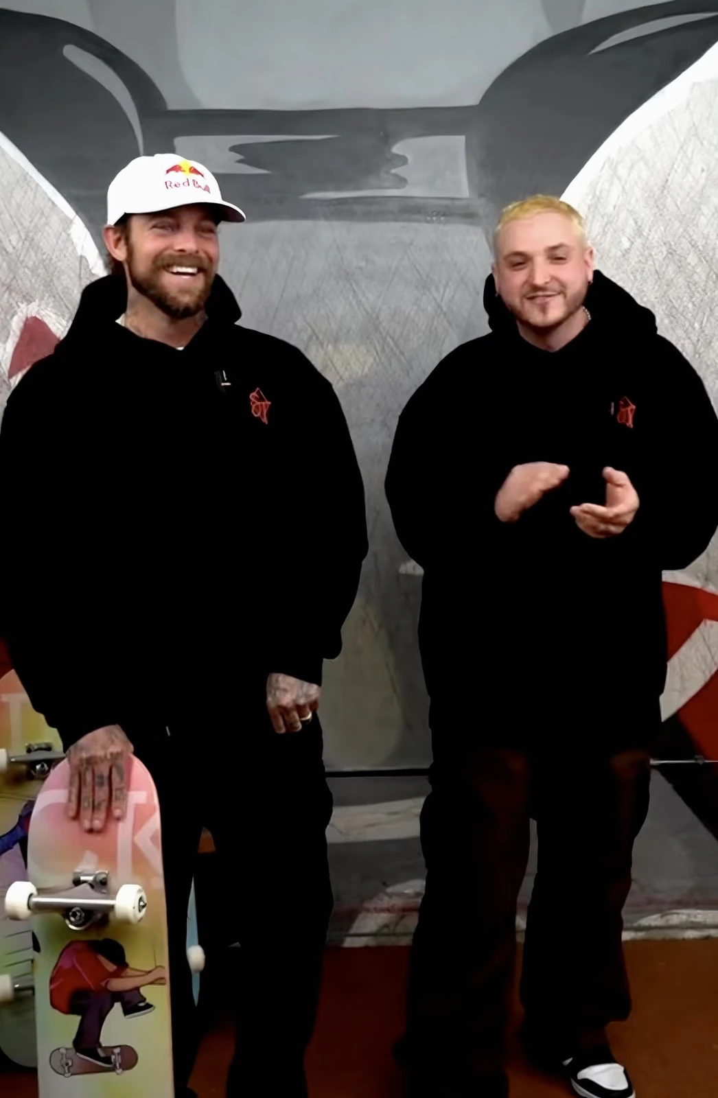 Ryan Sheckler and a host presenting a TikTok Shop livestream at a skatepark